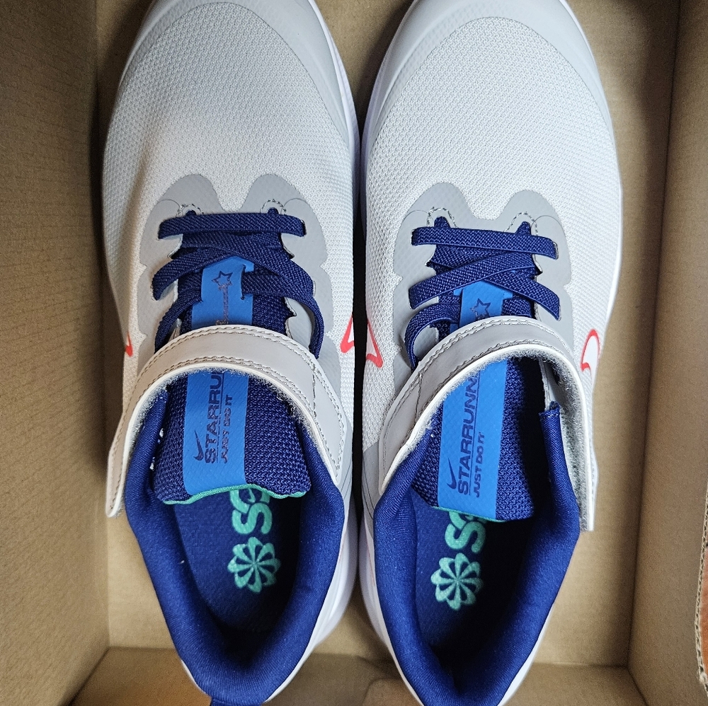 Nike Kids Sneakers - White, Blue, and Orange Accents